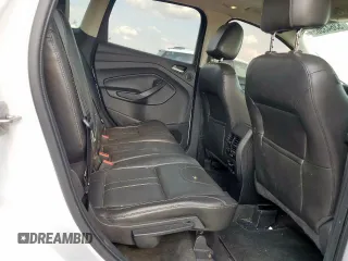 2013 Ford Escape Titanium z VIN 1FMCU0J90DUC13426, wystawiony jako Copart lot #53643565 z przebiegiem 176 600 mil mil oraz Szkoda całkowita • Salvage title. Historia ofert i sprzedaży dostępna na DreamBid. Obrazek 11.