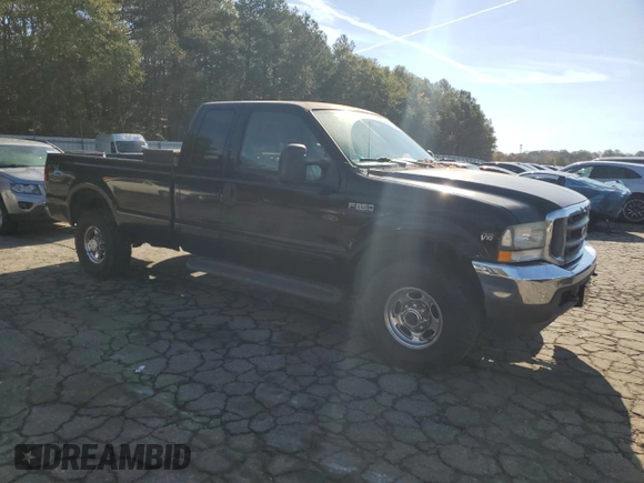 2002 Ford Super Duty F-250 XL with VIN 1FTNX21SX2EC00757, listed as a Copart auction lot 80952634 with 249,650 mi miles and Clean Title. Bid and sale history available at carsss.com. Image 4.