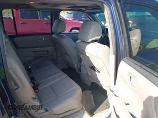 2014 Honda Pilot Touring with VIN 5FNYF4H92EB019248, listed as a IAAI auction lot 41942963 with 136,183 mi miles and . Bid and sale history available at carsss.com. Image 8.