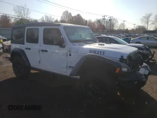 2023 Jeep Wrangler Willys with VIN 1C4HJXDG5PW543450, listed as a Copart auction lot 78455624 with 30,595 mi miles and Salvage Title. Bid and sale history available at DreamBid. Image 4.