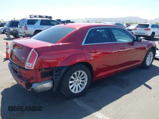 2013 Chrysler 300 Motown with VIN 2C3CCAAG3DH611992, listed as a IAAI auction lot 41997468 with 123,710 mi miles. Bid and sale history available at carsss.com. Image 4.