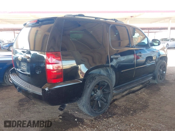 2007 Chevrolet Tahoe LS with VIN 1GNFC13C07J400472, listed as a IAAI auction lot 42209311 with 212,924 mi miles and . Bid and sale history available at DreamBid. Image 4.