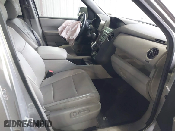2011 Honda Pilot Touring with VIN 5FNYF4H90BB084692, listed as a IAAI auction lot 41867622 with 62,805 mi miles. Bid and sale history available at carsss.com. Image 5.