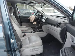 2018 Honda Pilot EX-L with VIN 5FNYF6H57JB007065, listed as a IAAI auction lot 41418432 with 123,806 mi miles. Bid and sale history available at carsss.com. Image 5.