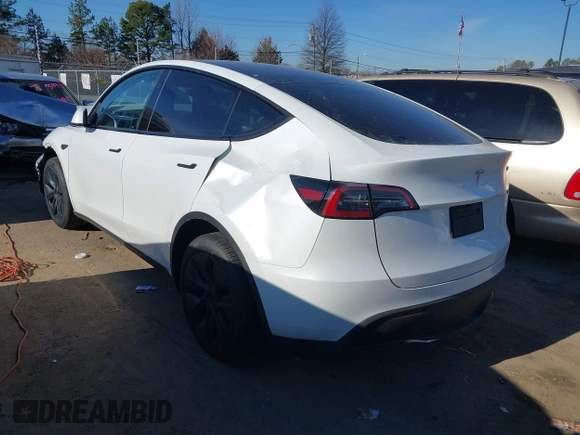 2025 Tesla Model Y Long Range with VIN 7SAYGDED9SA342374, listed as a IAAI auction lot 41663085 with 4,115 mi miles and . Bid and sale history available at DreamBid. Image 3.