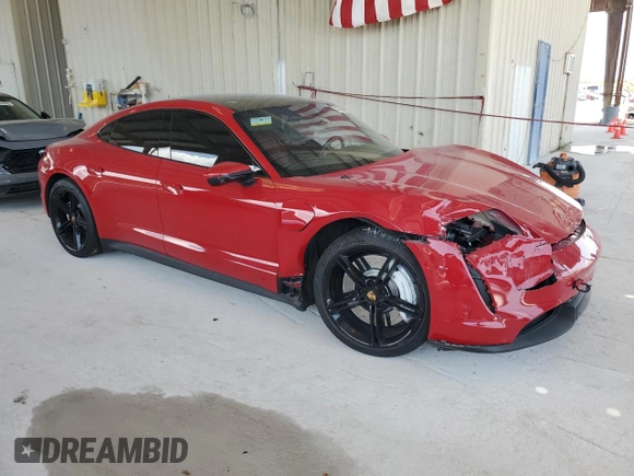 2022 Porsche Taycan with VIN WP0AA2Y15NSA10998, listed as a Copart auction lot 57882945 with Not provided miles and Salvage title. Bid and sale history available at DreamBid. Image 4.