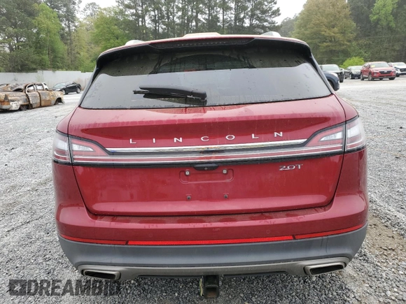2019 Lincoln Nautilus Reserve z VIN 2LMPJ6L9XKBL57034, wystawiony jako Copart lot #51652415 z przebiegiem 51 302 mil mil oraz Szkoda całkowita • Salvage title. Historia ofert i sprzedaży dostępna na DreamBid. Obrazek 6.