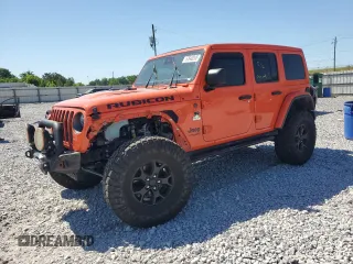 2019 Jeep Wrangler Unlimited Rubicon z VIN 1C4HJXFN9KW513159, wystawiony jako Copart lot #57640305 z przebiegiem 101 518 mil mil oraz Szkoda całkowita • Salvage title. Historia ofert i sprzedaży dostępna na DreamBid. Obrazek 1.