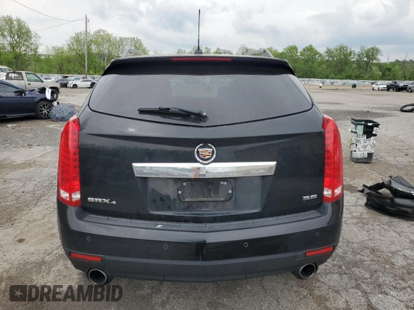 2015 Cadillac SRX Luxury Collection z VIN 3GYFNEE33FS574163, wystawiony jako Copart lot #56667985 z przebiegiem 103 697 mil mil oraz Szkody całkowita. Historia ofert i sprzedaży dostępna na DreamBid. Obrazek 6.