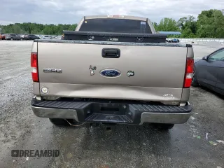 2004 Ford F-150 XLT with VIN 1FTPW14564KD21754, listed as a Copart auction lot 59007395 with 171,537 mi miles and Salvage title. Bid and sale history available at DreamBid. Image 6.
