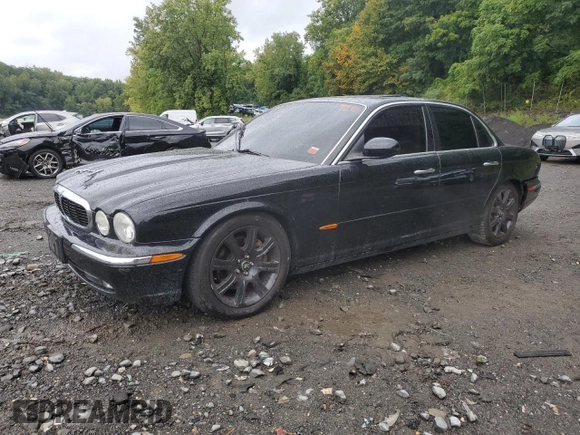 2004 Jaguar XJ with VIN SAJWA71C24SG33915, listed as a Copart auction lot 69626864 with 123,746 mi miles and Non Repairable. Bid and sale history available at carsss.com. Image 1.