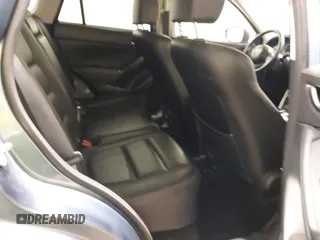 2015 Mazda CX-5 Grand Touring with VIN JM3KE4DY7F0504398, listed as a IAAI auction lot 41698365 with 122,121 mi miles. Bid and sale history available at carsss.com. Image 8.