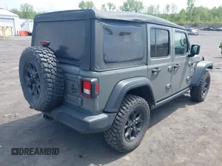 2021 Jeep Wrangler Unlimited Willys с VIN 1C4HJXDNXMW815548, выставлен на аукционе IAAI как лот 42226665 с пробегом 55 457 миль миль и . История ставок и продаж доступна на DreamBid. Изображение 4.