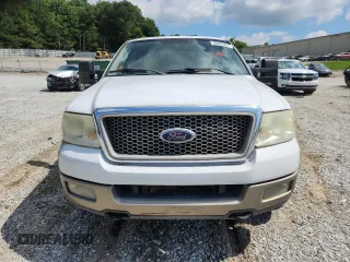 2004 Ford F-150 XLT with VIN 1FTPX14504NB10707, listed as a Copart auction lot 59894995 with 244,545 mi miles and Salvage title. Bid and sale history available at DreamBid. Image 5.