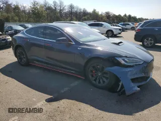 2019 Tesla Model S 100D с VIN 5YJSA1E42KF312803, выставлен на аукционе Copart как лот 71246484 с пробегом 89 820 миль миль и На запчасти • Non repairable. История ставок и продаж доступна на DreamBid. Изображение 4.