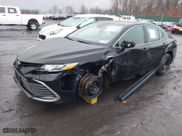 2021 Toyota Camry Hybrid LE with VIN 4T1C31AK9MU566159, listed as a IAAI auction lot 41734274 with 40,250 mi miles. Bid and sale history available at carsss.com. Image 17.