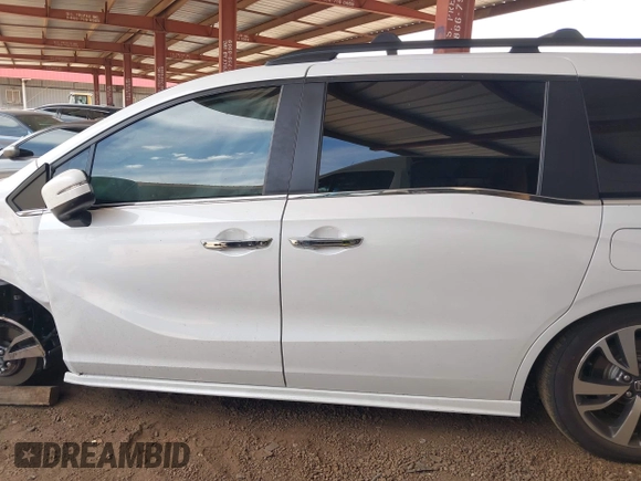 2021 Honda Odyssey Touring z VIN 5FNRL6H85MB034888, wystawiony jako IAAI lot #42386984 z przebiegiem 40 514 mil mil oraz . Historia ofert i sprzedaży dostępna na DreamBid. Obrazek 14.