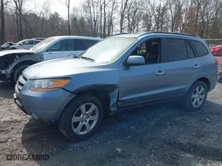 2009 Hyundai Santa Fe SE with VIN 5NMSH13E69H332648, listed as a IAAI auction lot 41948343 with 164,653 mi miles. Bid and sale history available at carsss.com. Image 6.