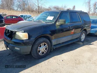 2004 Ford Expedition XLT with VIN 1FMPU16WX4LB12891, listed as a IAAI auction lot 41695636 with 209,574 mi miles. Bid and sale history available at carsss.com. Image 2.