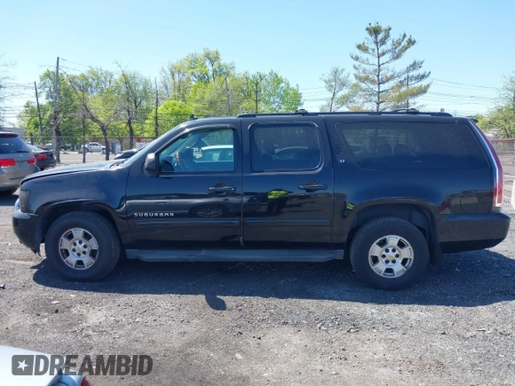 2012 Chevrolet Suburban LT with VIN 1GNSCJE09CR168533, listed as a IAAI auction lot 42142325 with 250,582 mi miles. Bid and sale history available at carsss.com. Image 14.