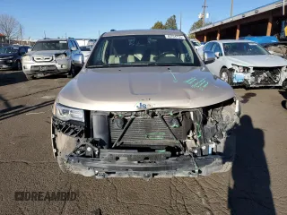 2015 Jeep Grand Cherokee High Altitude with VIN 1C4RJFCM6FC878769, listed as a Copart auction lot 46704755 with 81,727 mi miles and Salvage title. Bid and sale history available at DreamBid. Image 5.