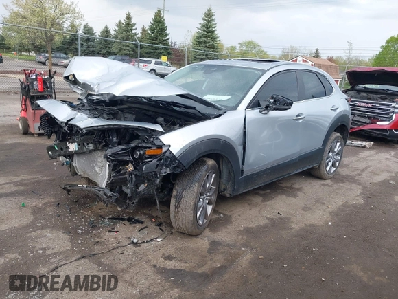2021 Mazda CX-30 Preferred with VIN 3MVDMBCL6MM240663, listed as a IAAI auction lot 42165803 with 52,262 mi miles and . Bid and sale history available at DreamBid. Image 2.