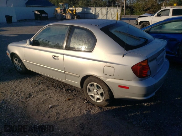 2004 Hyundai Accent GL with VIN KMHCG35C44U284868, listed as a Copart auction lot 74054884 with 87,259 mi miles and Clean Title. Bid and sale history available at carsss.com. Image 2.