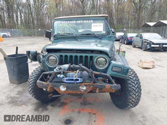 1999 Jeep Wrangler Sahara with VIN 1J4FY49S7XP440582, listed as a IAAI auction lot 41967151 with 163,710 mi miles and . Bid and sale history available at DreamBid. Image 12.