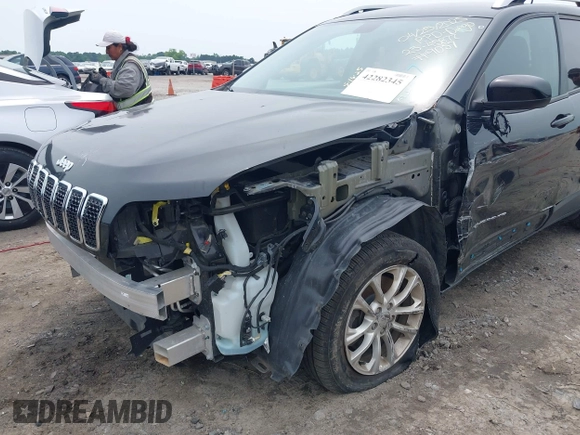 2020 Jeep Cherokee Latitude with VIN 1C4PJLCB5LD539057, listed as a IAAI auction lot 42282345 with 68,676 mi miles and . Bid and sale history available at DreamBid. Image 6.