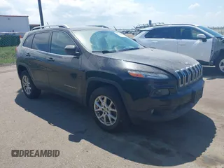 2015 Jeep Cherokee Latitude with VIN 1C4PJMCS3FW545440, listed as a IAAI auction lot 42268676 with 197,192 mi miles and . Bid and sale history available at DreamBid. Image 1.