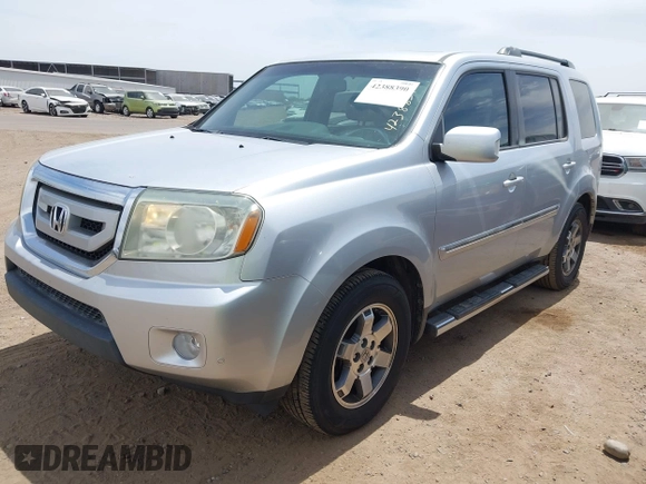 2011 Honda Pilot Touring z VIN 5FNYF3H90BB006634, wystawiony jako IAAI lot #42388390 z przebiegiem 218 475 mil mil oraz . Historia ofert i sprzedaży dostępna na DreamBid. Obrazek 17.
