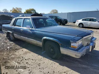 1992 Cadillac Brougham z VIN 1G6DW54E7NR707492, wystawiony jako Copart lot #79950214 z przebiegiem 263 624 mil mil oraz Tytuł czysty. Historia ofert i sprzedaży dostępna na DreamBid. Obrazek 4.