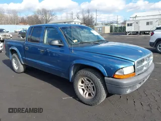 2004 Dodge Dakota Sport with VIN 1D7HL38K84S573410, listed as a IAAI auction lot 41495481 with 218,866 mi miles. Bid and sale history available at carsss.com. Image 1.