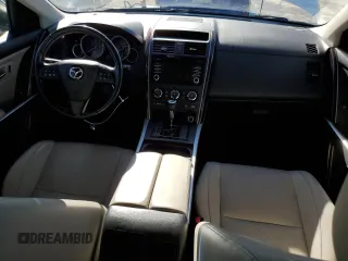 2015 Mazda CX-9 Grand Touring с VIN JM3TB2DA1F0462203, выставлен на аукционе Copart как лот 37073714 с пробегом 101 293 миль миль и Списание • Salvage title. История ставок и продаж доступна на DreamBid. Изображение 8.