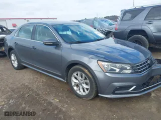 2017 Volkswagen Passat 1.8T S with VIN 1VWAT7A31HC043900, listed as a IAAI auction lot 41433985 with 147,466 mi miles. Bid and sale history available at carsss.com. Image 1.
