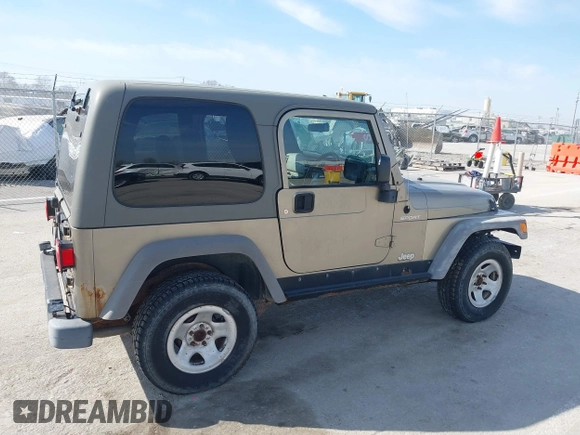 2006 Jeep Wrangler Sport Right Hand Drive with VIN 1J4F449S46P716520, listed as a IAAI auction lot 41763887 with 236,816 mi miles. Bid and sale history available at carsss.com. Image 16.
