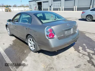 2005 Nissan Altima SE z VIN 1N4BL11D65C148642, wystawiony jako IAAI lot #42056330 z przebiegiem 81 328 mil mil oraz . Historia ofert i sprzedaży dostępna na DreamBid. Obrazek 3.