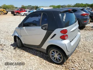2009 Smart fortwo Pure with VIN WMEEJ31X49K224990, listed as a Copart auction lot 52111335 with 72,317 mi miles and Salvage Title. Bid and sale history available at carsss.com. Image 2.
