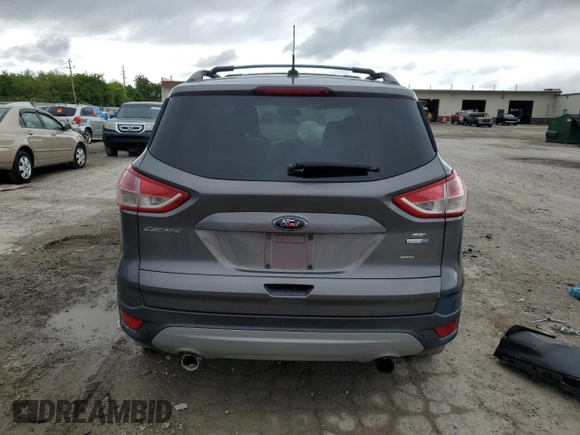2013 Ford Escape SE с VIN 1FMCU9GX4DUA96010, выставлен на аукционе Copart как лот 57591945 с пробегом 162 760 миль миль и Списание • Salvage title. История ставок и продаж доступна на DreamBid. Изображение 6.