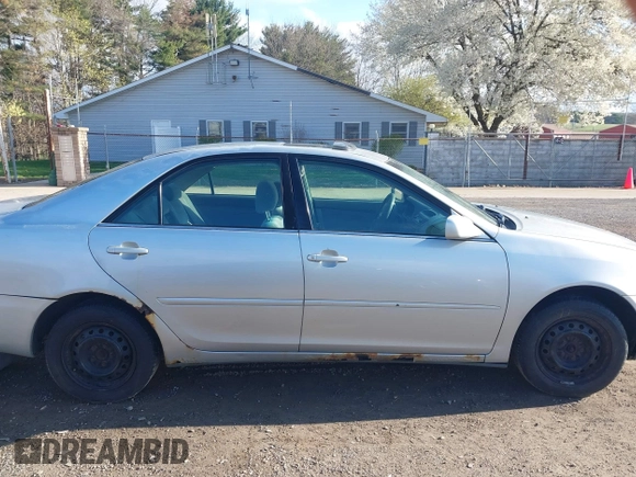 2004 Toyota Camry LE with VIN 4T1BE32K64U282875, listed as a IAAI auction lot 42038006 with 238,605 mi miles. Bid and sale history available at carsss.com. Image 14.