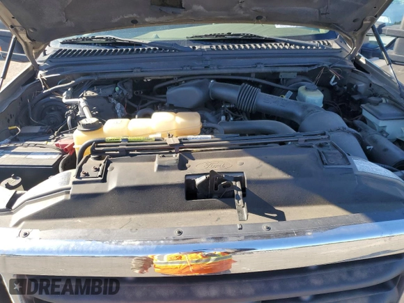 2002 Ford F-250 XL with VIN 1FTNF21L02EA83007, listed as a Copart auction lot 87880345 with 104,889 mi miles and Salvage title. Bid and sale history available at DreamBid. Image 11.