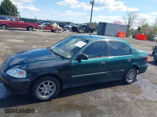 2000 Honda Civic LX with VIN 1HGEJ6672YL022393, listed as a IAAI auction lot 41968262 with 231,261 mi miles. Bid and sale history available at carsss.com. Image 14.