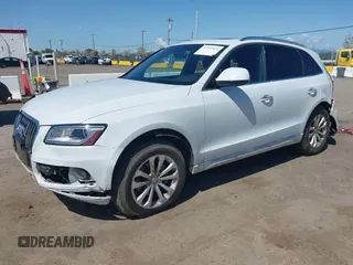 2015 Audi Q5 Premium Plus with VIN WA1LFAFP6FA096946, listed as a IAAI auction lot 41956824 with 97,328 mi miles and . Bid and sale history available at DreamBid. Image 2.