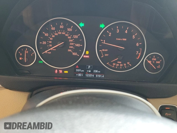 2014 BMW 3 Series 320i with VIN WBA3B1G5XENT00747, listed as a Copart auction lot 64737935 with 123,374 mi miles and Salvage title. Bid and sale history available at DreamBid. Image 9.
