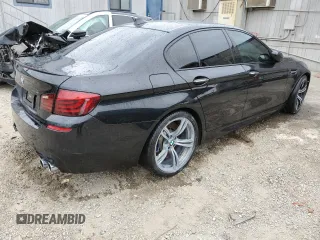 2013 BMW M5 z VIN WBSFV9C56DD096294, wystawiony jako Copart lot #57855005 z przebiegiem Nie podano mil oraz Tytuł czysty. Historia ofert i sprzedaży dostępna na DreamBid. Obrazek 3.