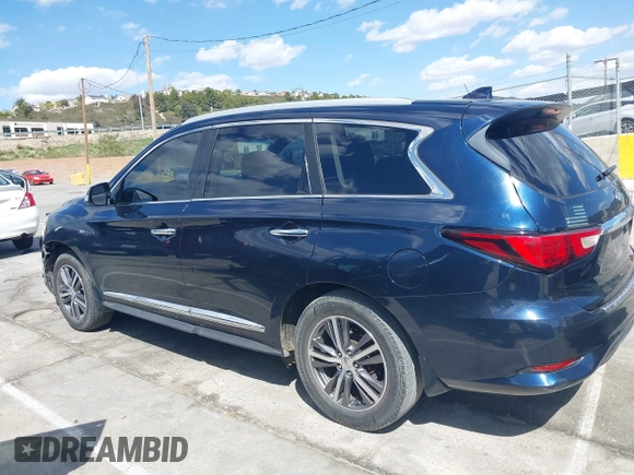 2016 Infiniti QX60 with VIN 5N1AL0MNXGC520860, listed as a IAAI auction lot 41955662 with 165,716 mi miles. Bid and sale history available at carsss.com. Image 14.