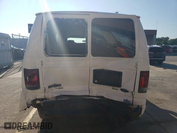 2010 Ford Econoline Passenger XL with VIN 1FMNE1BW2ADA11991, listed as a Copart auction lot 63758014 with 32,785 mi miles and Salvage Title. Bid and sale history available at DreamBid. Image 6.