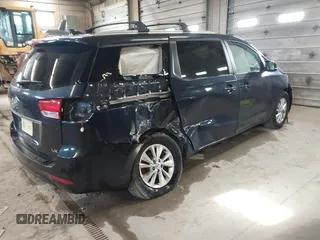 2016 Kia Sedona LX with VIN KNDMB5C10G6161548, listed as a IAAI auction lot 41957535 with 130,228 mi miles and . Bid and sale history available at DreamBid. Image 4.