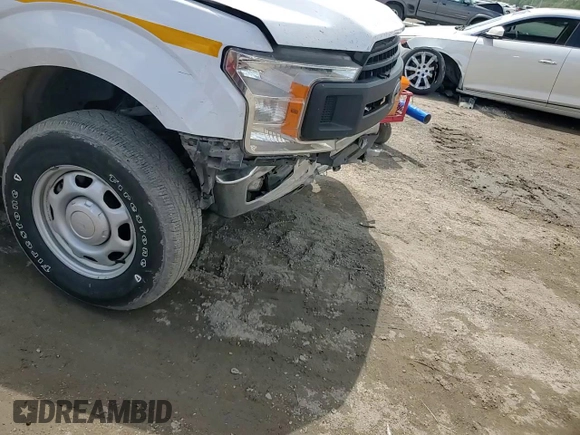 2020 Ford F-150 XL z VIN 1FTMF1EB6LKD12333, wystawiony jako Copart lot #56359485 z przebiegiem 124 979 mil mil oraz Szkoda całkowita • Salvage title. Historia ofert i sprzedaży dostępna na DreamBid. Obrazek 13.