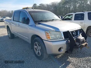 2007 Nissan Titan LE with VIN 1N6BA07B97N233897, listed as a IAAI auction lot 41713818 with 229,803 mi miles. Bid and sale history available at carsss.com. Image 1.